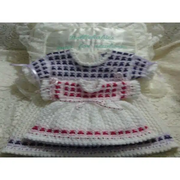 premature and 3 month baby dresses knitted from DollieBabies Knitting Pattern Book 3