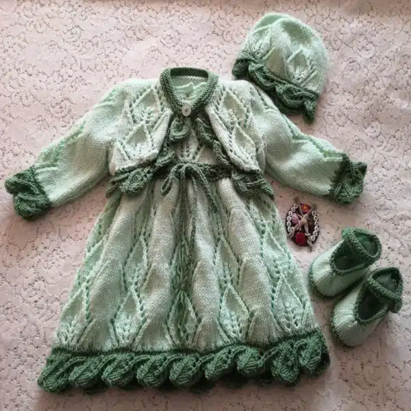 Leafy lace baby dress knitting pattern