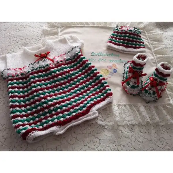 Christmas coloured baby romper knitted from DollieBabies Knitting Pattern 016